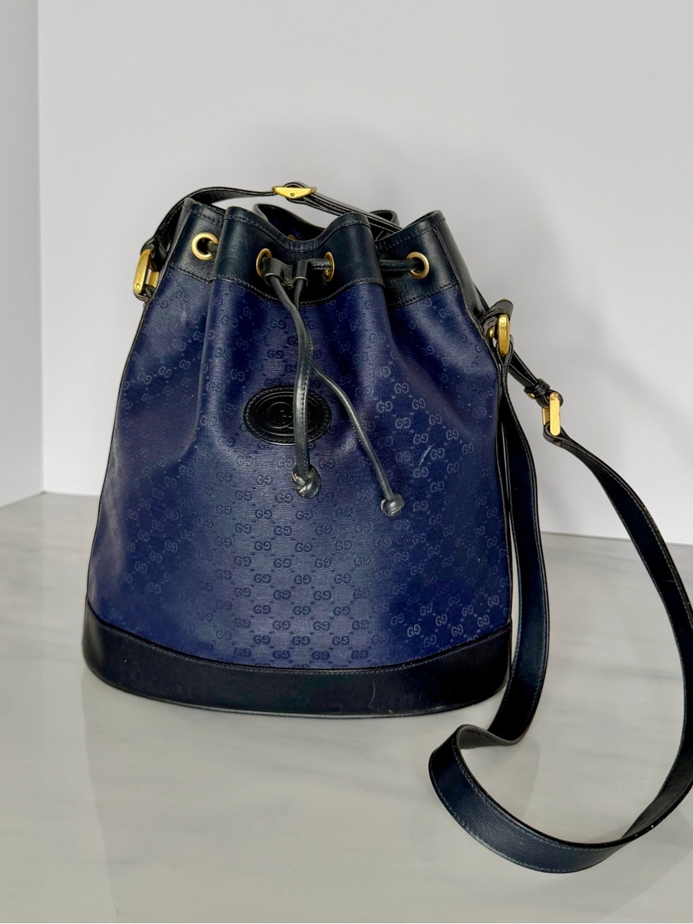 Rare Vintage GG Monogram Navy Drawstring Bucket Crossbody Bag Gold Hardware